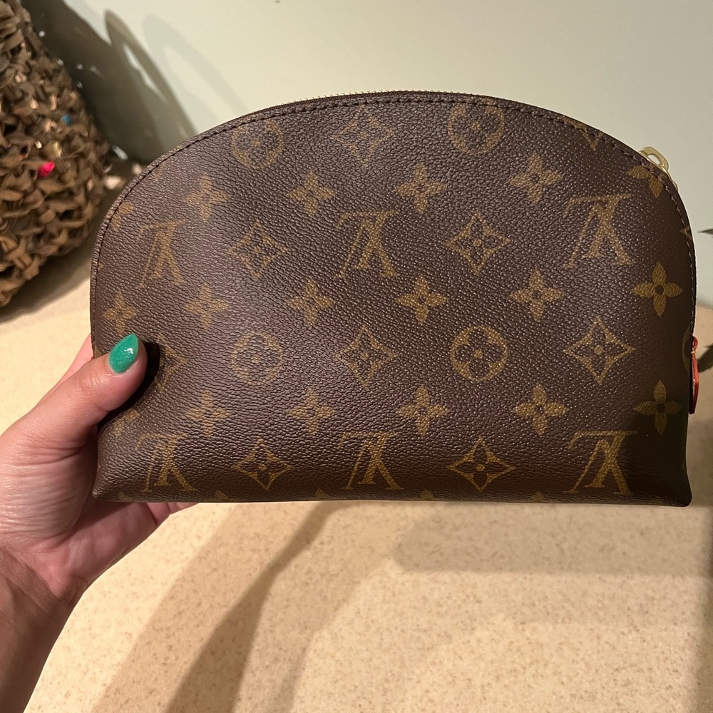 Like new Louis Vuitton GM cosmetic pouch
